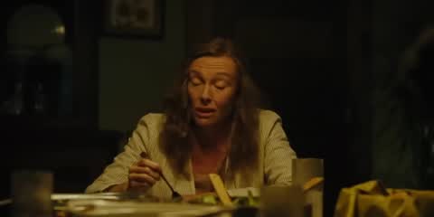 Still frame from Hereditary dinner scene — a 3m 05s clip marked up for dubbing